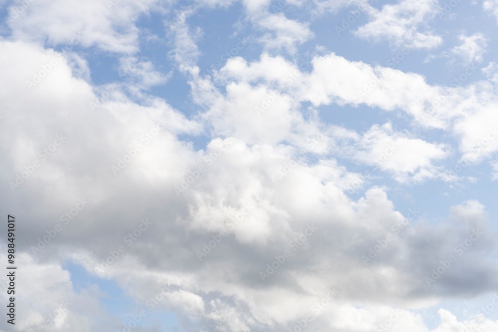Fluffy white clouds, against a bright blue sky, with little editing. Fluffy white clouds, against a bright blue sky, with little editing.