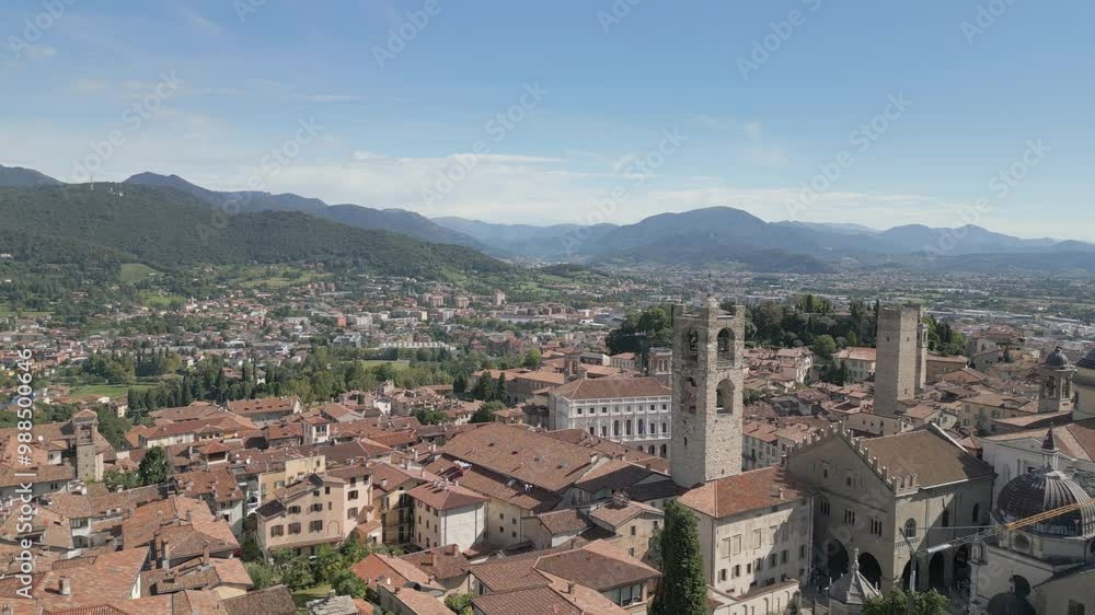 Moving away from the Piazza Vecchia of Bergamo Alta to enjoy the magnificent panorama of the entire Alta city, taken during a beautiful sunny day Moving away from the Piazza Vecchia of Bergamo Alta to enjoy the magnificent panorama of the entire Alta city, taken during a beautiful sunny day