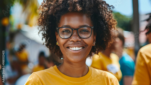 A medium close-up of a person smiling warmly while volunteering, embodying kindness and compassion, two attributes of a generous spirit.