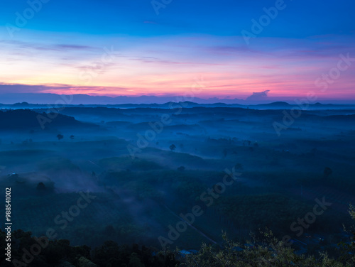 Landscape of beautiful morning fog sunrise at Khao Na Nai Luang Dharma Park in Surat Thani province, Thailand photo