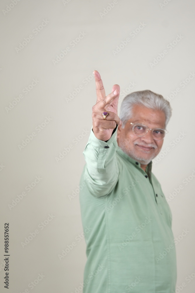Confident Mature Man Smiling in Casual Attire, Embracing Life's Simplicity and Joy. Confident Mature Man Smiling in Casual Attire, Embracing Life's Simplicity and Joy.