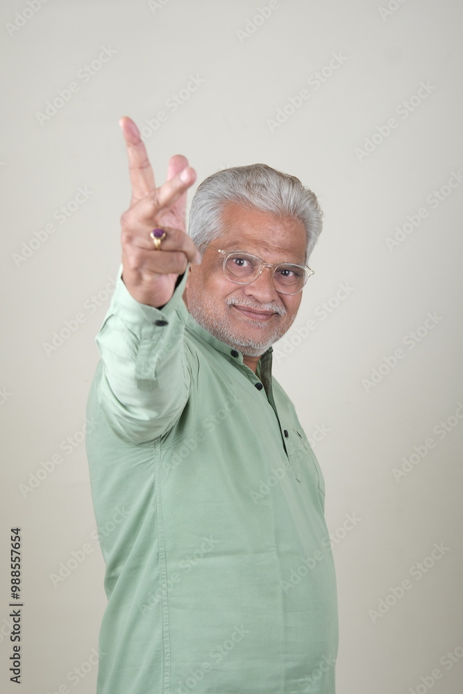 Confident Mature Man Smiling in Casual Attire, Embracing Life's Simplicity and Joy. Confident Mature Man Smiling in Casual Attire, Embracing Life's Simplicity and Joy.