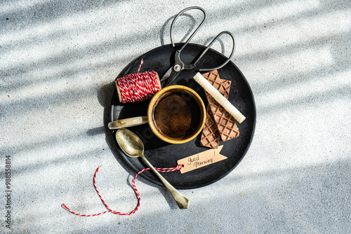 Top view of a morning coffee setup with treats and crafts photo