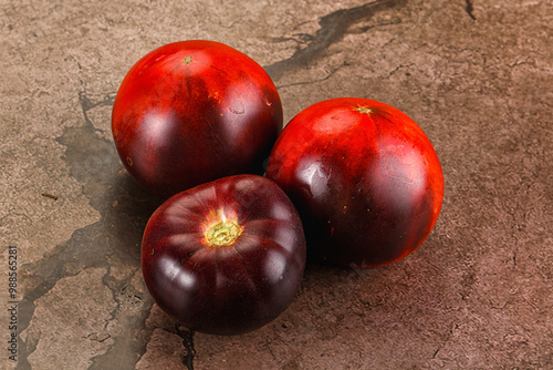 Black ripe juicy organic tomato