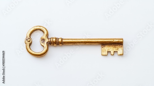 A shiny golden key, old-fashioned in design, lies flat in the center of the white background, its metal catching light.