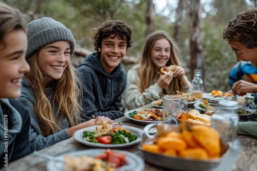 Parents and teenage kids eating outdoors in a forest, portrait, Generative AI