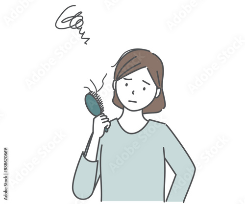 抜け毛を気にする女性