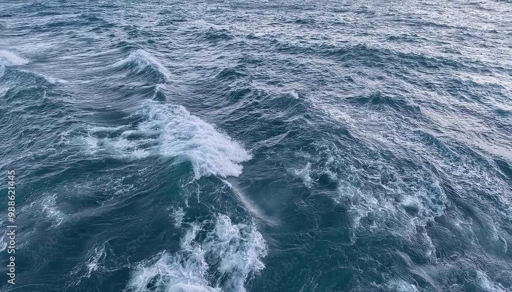 Vast Ocean Waves in Motion. Turbulent Aqua Blue Waters with White Foam Crests, Capturing the Natural Energy of the Sea in a Dynamic, Overhead Perspective Vast Ocean Waves in Motion. Turbulent Aqua Blue Waters with White Foam Crests, Capturing the Natural Energy of the Sea in a Dynamic, Overhead Perspective