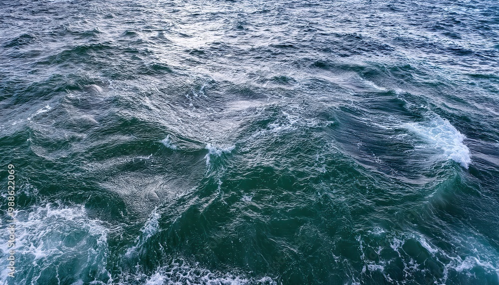 Vast Ocean Waves in Motion. Turbulent Aqua Blue Waters with White Foam Crests, Capturing the Natural Energy of the Sea in a Dynamic, Overhead Perspective Vast Ocean Waves in Motion. Turbulent Aqua Blue Waters with White Foam Crests, Capturing the Natural Energy of the Sea in a Dynamic, Overhead Perspective