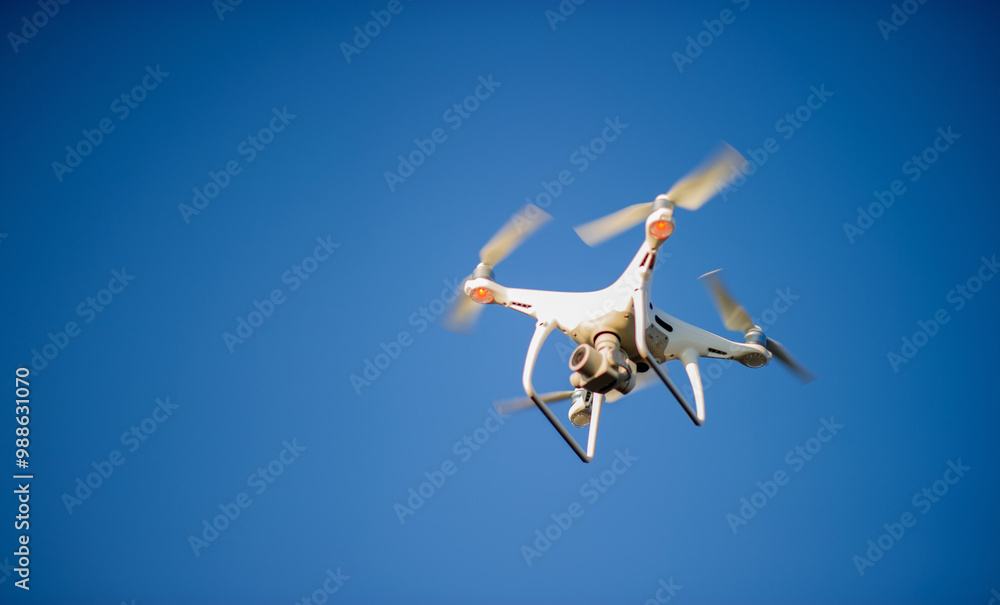 Drones take aerial photos of tourists and professional photographers. Flying photography equipment. Drones take aerial photos of tourists and professional photographers. Flying photography equipment.