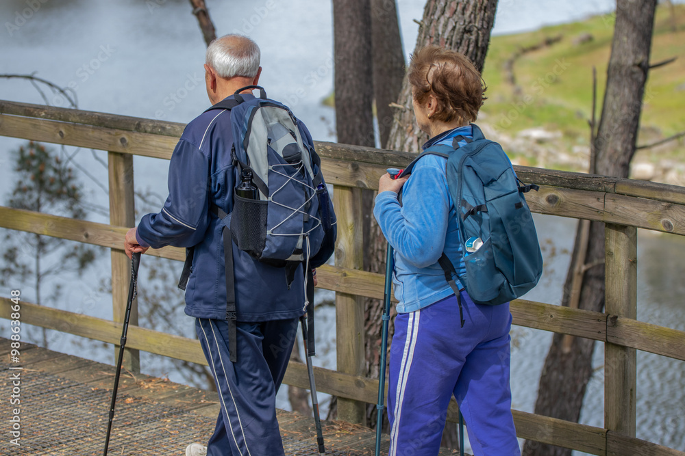 senior couple hiking outdoors in nature senior couple hiking outdoors in nature