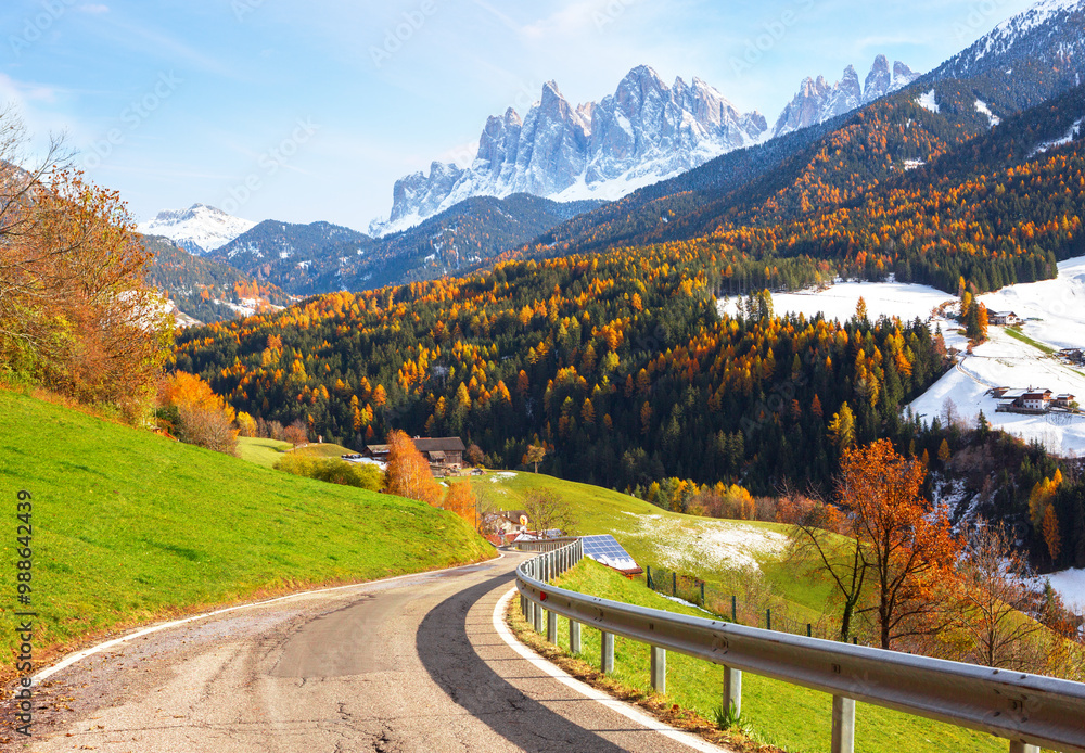 Scenic mountain road on sunny day in late autumn, Val di Funes, Dolomite mountains, South Tyrol, Northern Italy.
