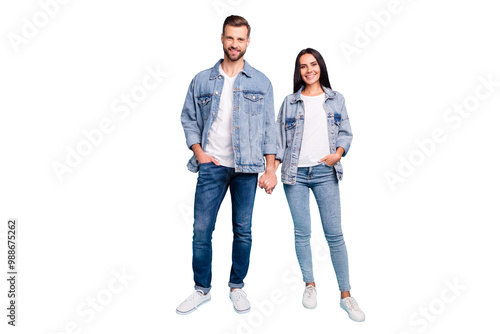 Full length photo of cute people smiling wearing denim jeans jackets isolated over blue background