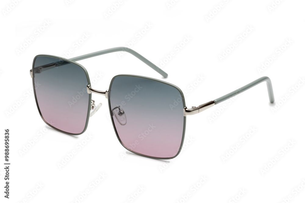 Elegant sunglasses with square frames and gradient lenses on a white background, ideal to enhance any outfit with a touch of elegance. Elegant sunglasses with square frames and gradient lenses on a white background, ideal to enhance any outfit with a touch of elegance.