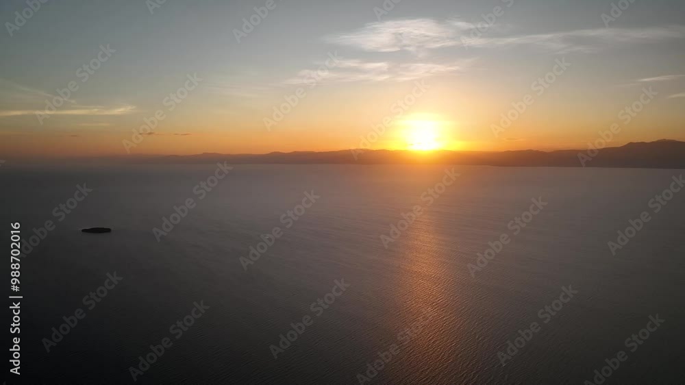 Sunset With Golden Sky Over The Sea In Moalboal Town, Cebu Island, Philippines. Wide Shot Sunset With Golden Sky Over The Sea In Moalboal Town, Cebu Island, Philippines. Wide Shot