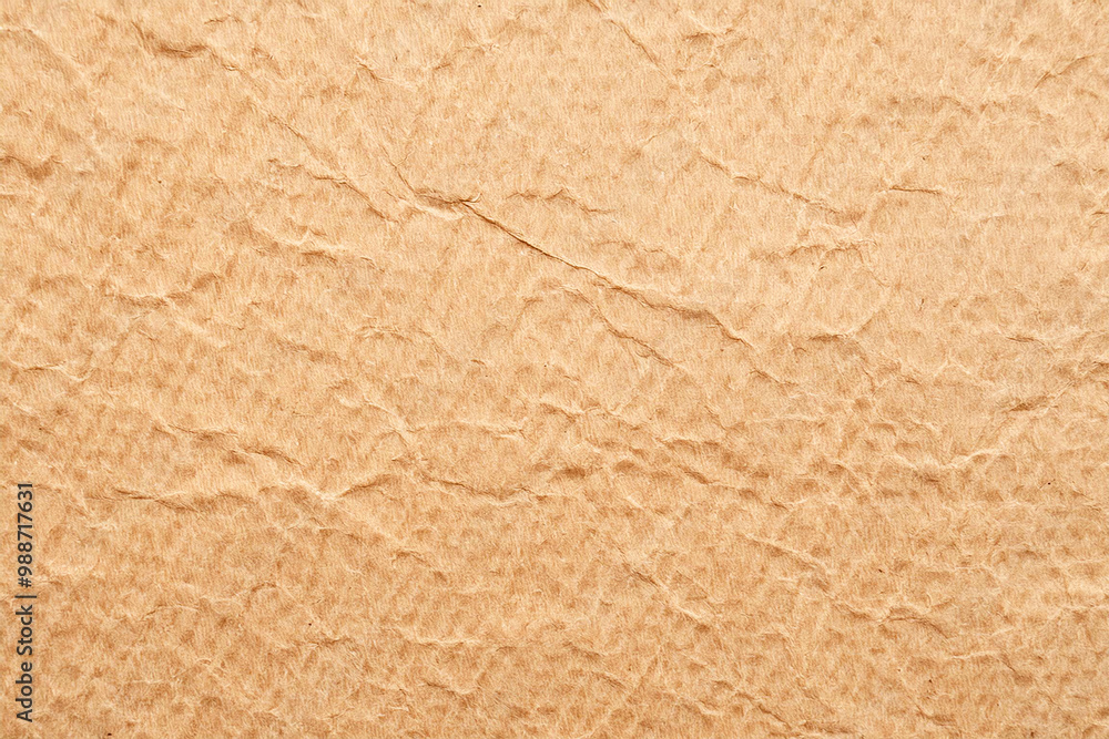 Fototapeta premium Creative light brown rough crumpled paper texture background design.