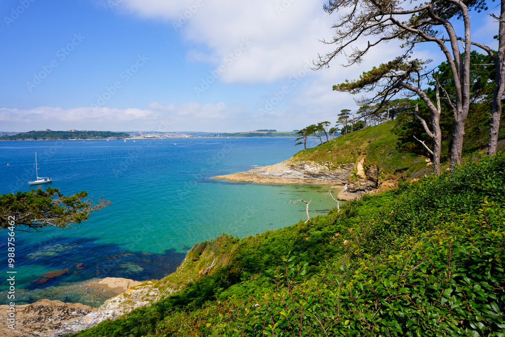 Fototapeta premium From St Anthony Head, across the River Fal estuary to a distant Falmouth in Cornwall.