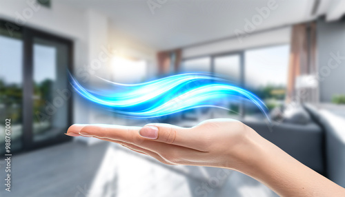 Hand holds a light wave of fresh clean air. Fresh scent and air filtration effect. Air conditioner concept.