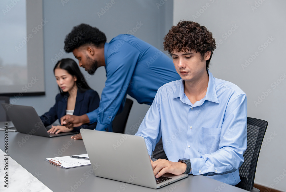 portrait a caucasian man office worker working with laptop in the office portrait a caucasian man office worker working with laptop in the office