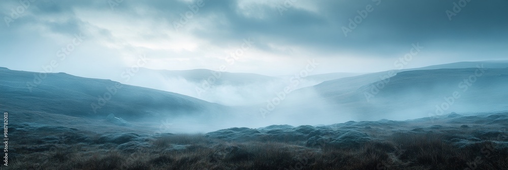 Misty Moorland Vista, enveloped in gentle fog, rolling hills stretch beneath a soft, cloudy sky, creating a serene, ethereal landscape. Misty Moorland Vista, enveloped in gentle fog, rolling hills stretch beneath a soft, cloudy sky, creating a serene, ethereal landscape.