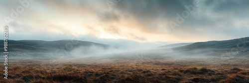 Misty Moorland Serenity, tranquil landscape of rolling hills shrouded in mist, soft clouds above create an ethereal atmosphere