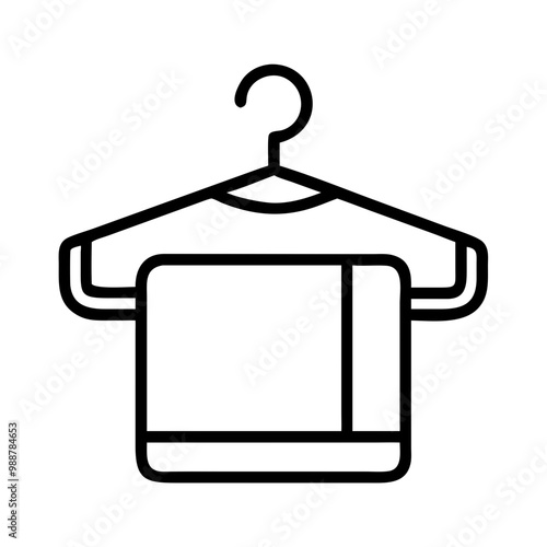 A towel is hanging on a clothes hanger, neatly folded and ready to be used. The image is in black and white, giving it a classic and timeless feel