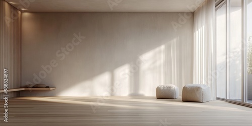 A large empty room with a tan wall and a tan carpet. There are two white bean bags in the room