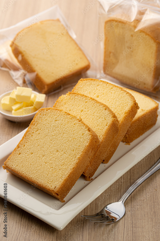 Freshly Sliced Butter Cake on a Wooden Table Freshly Sliced Butter Cake on a Wooden Table