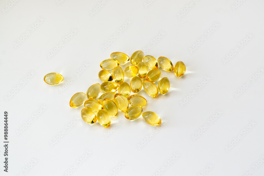 Cod liver oil vitamin e soft gel capsules on white background Cod liver oil vitamin e soft gel capsules on white background