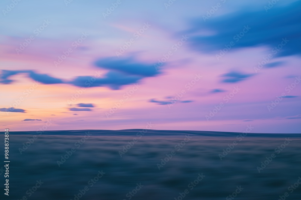 A beautiful blurred sky at dusk with an amazing play of light and colors A beautiful blurred sky at dusk with an amazing play of light and colors