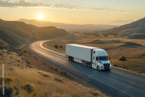 Semi-Truck on a Winding Road at Sunset photo