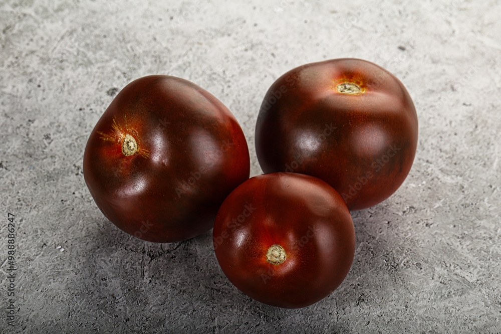 Obraz premium Organic natural juicy Kumato tomato