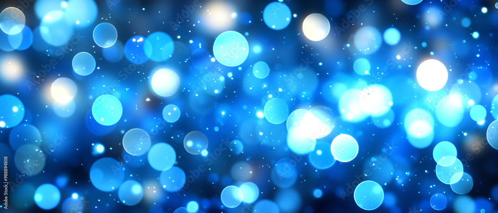 An enchanting blue bokeh background, perfect for creating a dreamy atmosphere in various designs and projects. An enchanting blue bokeh background, perfect for creating a dreamy atmosphere in various designs and projects.