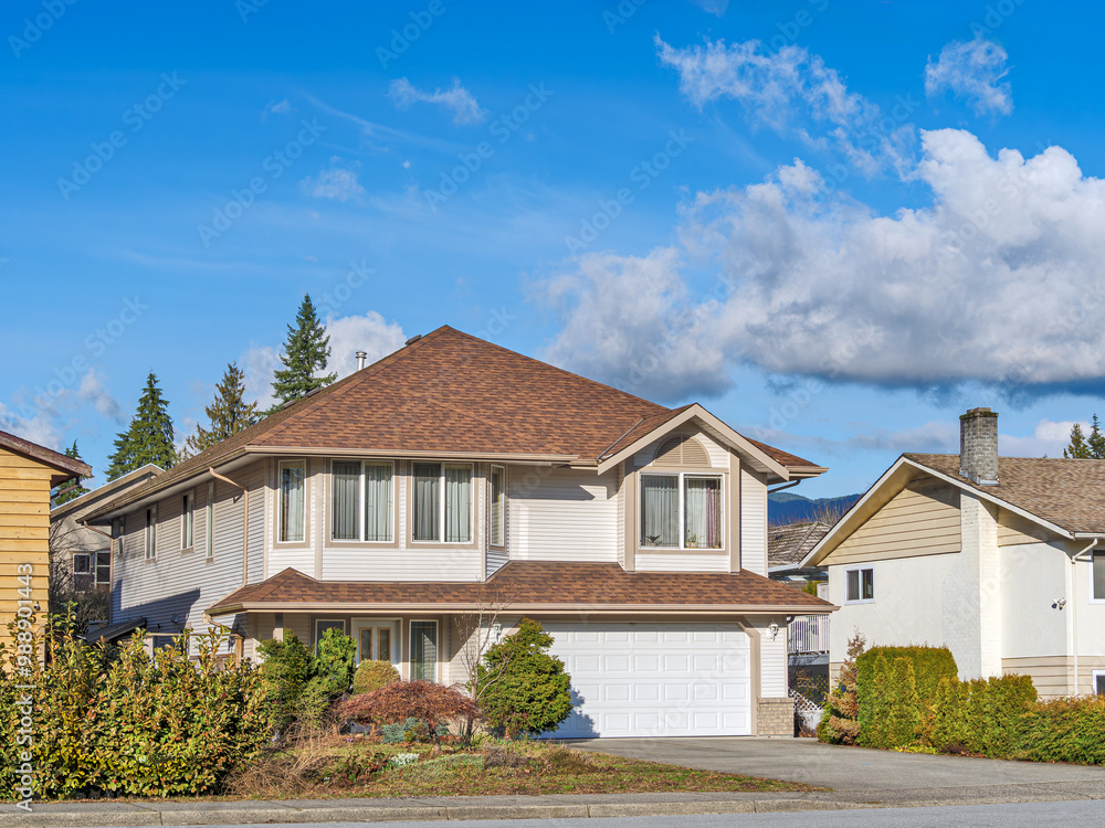 Big residential house on bright winter day in British Columbia Big residential house on bright winter day in British Columbia