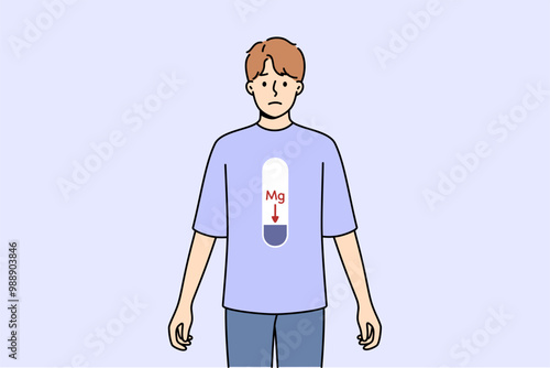 Magnesium deficiency in body of man with MG scale on stomach, and negative emotions on face. Problem of magnesium deficiency negatively affects health of bones and teeth or cardiovascular system