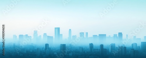 A hazy skyline of tall buildings against a blue gradient sky.