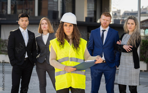 Valokuva Portrait of arquitect team colleagues together committed to finish their project