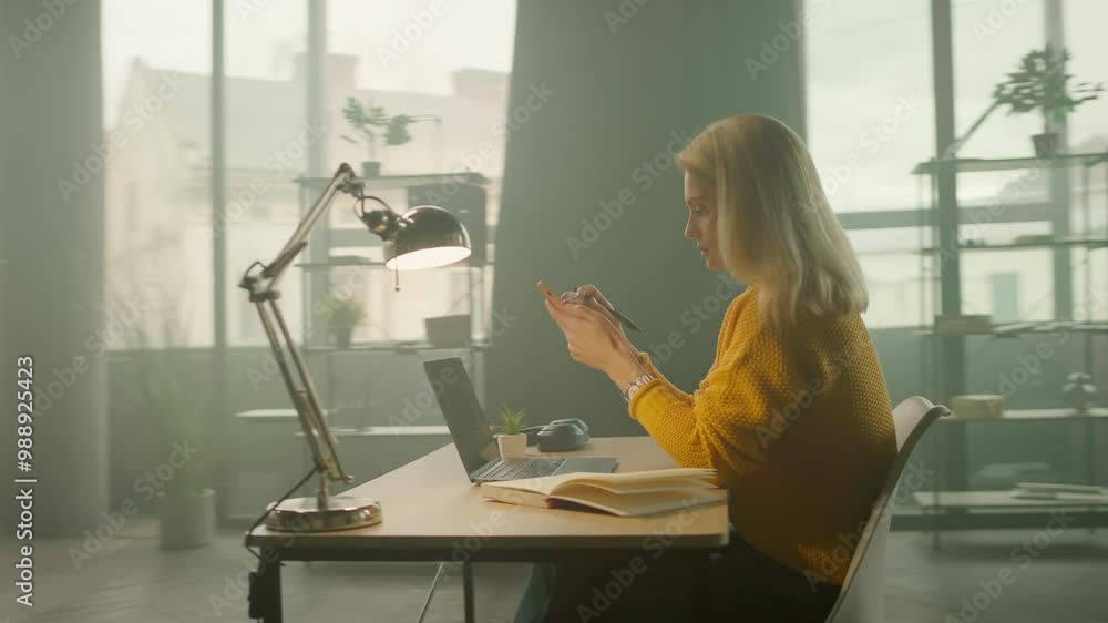 Worker attractive woman use phone writing notes in office. Busy work day. Thinking. Camera moving around. 360 degrees Worker attractive woman use phone writing notes in office. Busy work day. Thinking. Camera moving around. 360 degrees