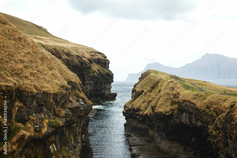 Rugged coastline with cliffs and narrow waterway Rugged coastline with cliffs and narrow waterway
