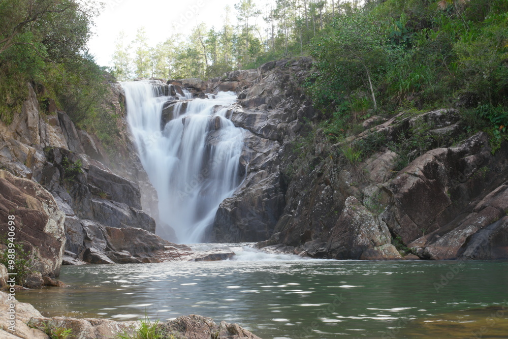 Naklejka premium Explore the stunning Belize Big Rock Waterfalls surrounded by lush nature and tranquility for a perfect outdoor adventure