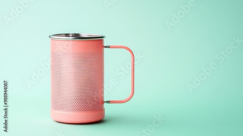 Pastel Pink Stainless Steel Eco-Friendly Tea Infuser on Light Mint Background photo