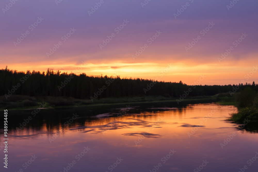 River in nature at sunset with blue sky. Landscape water beautiful concept. Long sunset over the river with bright sky and long grass in the evening. A bright evening sky and a nature long river in. River in nature at sunset with blue sky. Landscape water beautiful concept. Long sunset over the river with bright sky and long grass in the evening. A bright evening sky and a nature long river in.