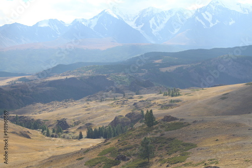 Scenic view of mountains and snowy tops of Altai mountains.