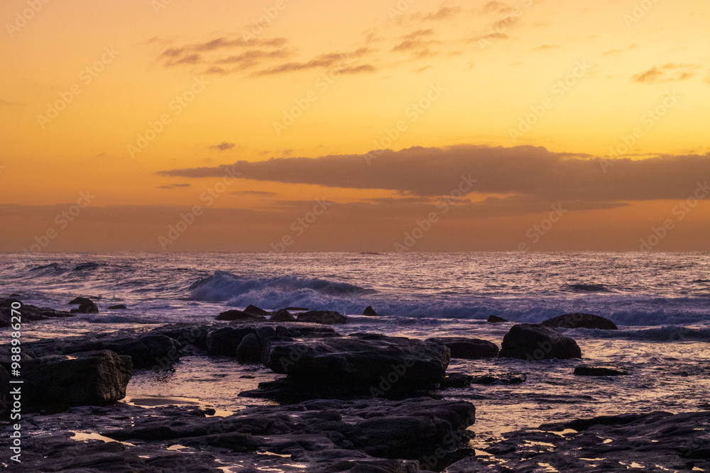 Fototapeta premium Landscape of the south coast ocean with Sunrise located at Orange Rocks, Uvongu in Margate, South Africa