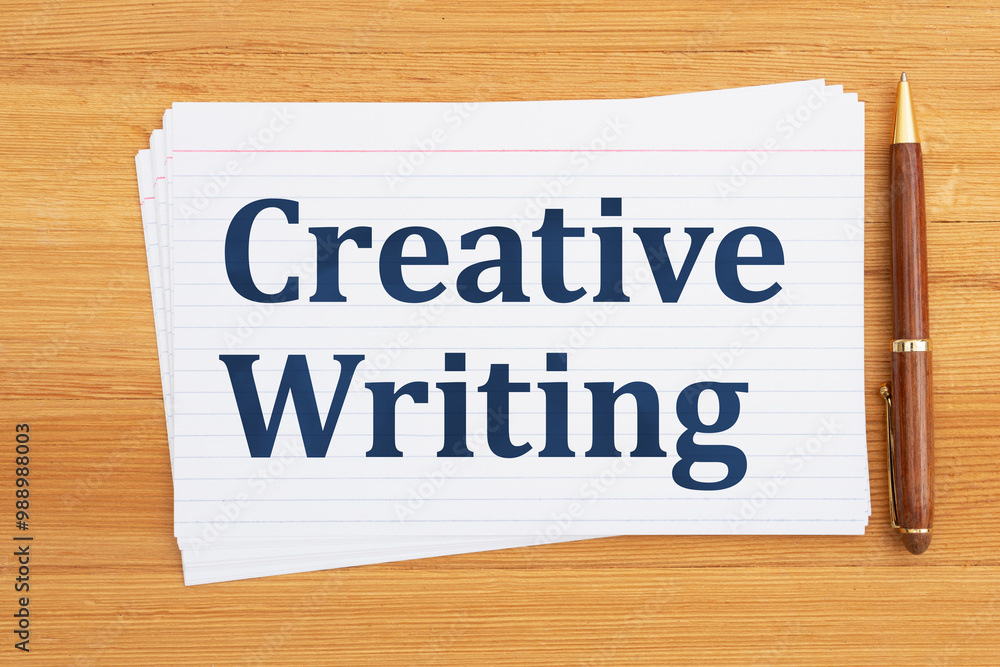 Creative Writing message on index cards with pen on a desk Creative Writing message on index cards with pen on a desk