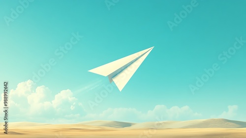 A paper airplane flying through the air over a desert landscape.