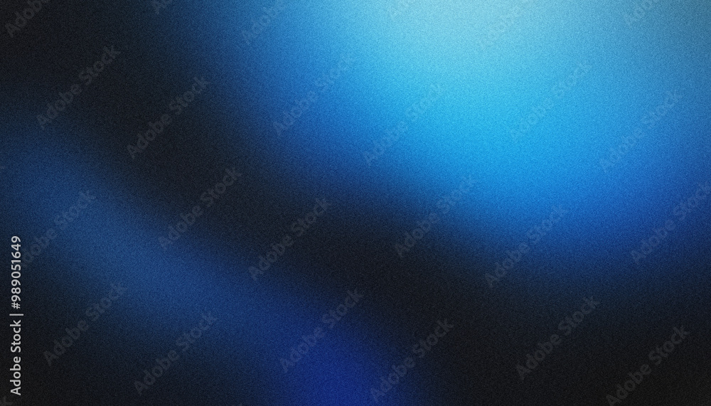 Smooth diagonal light beam fading into a blue grainy background in the dark area Smooth diagonal light beam fading into a blue grainy background in the dark area