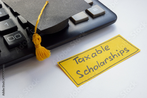 Graduation cap with a note about taxable scholarships.