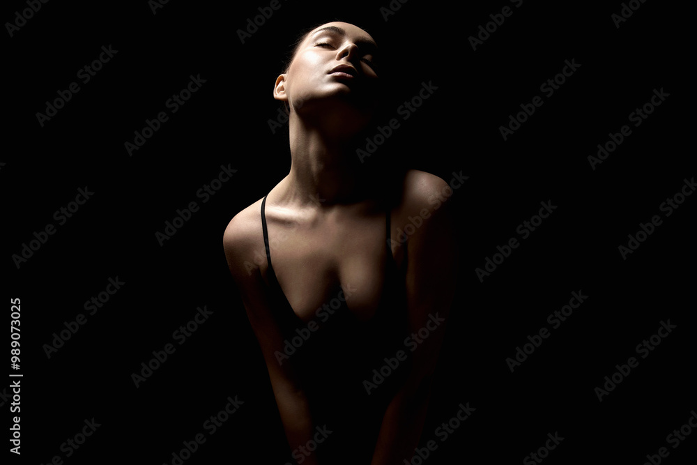 Sexy Woman silhouette in the dark. Beautiful Body passion Girl