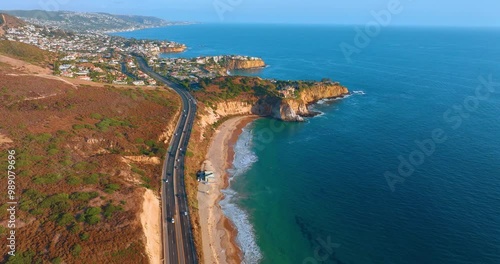 Aerial view of scenic Pacific coast in Los Angeles. Route 101 along the rocky mountains and sandy beach. photo